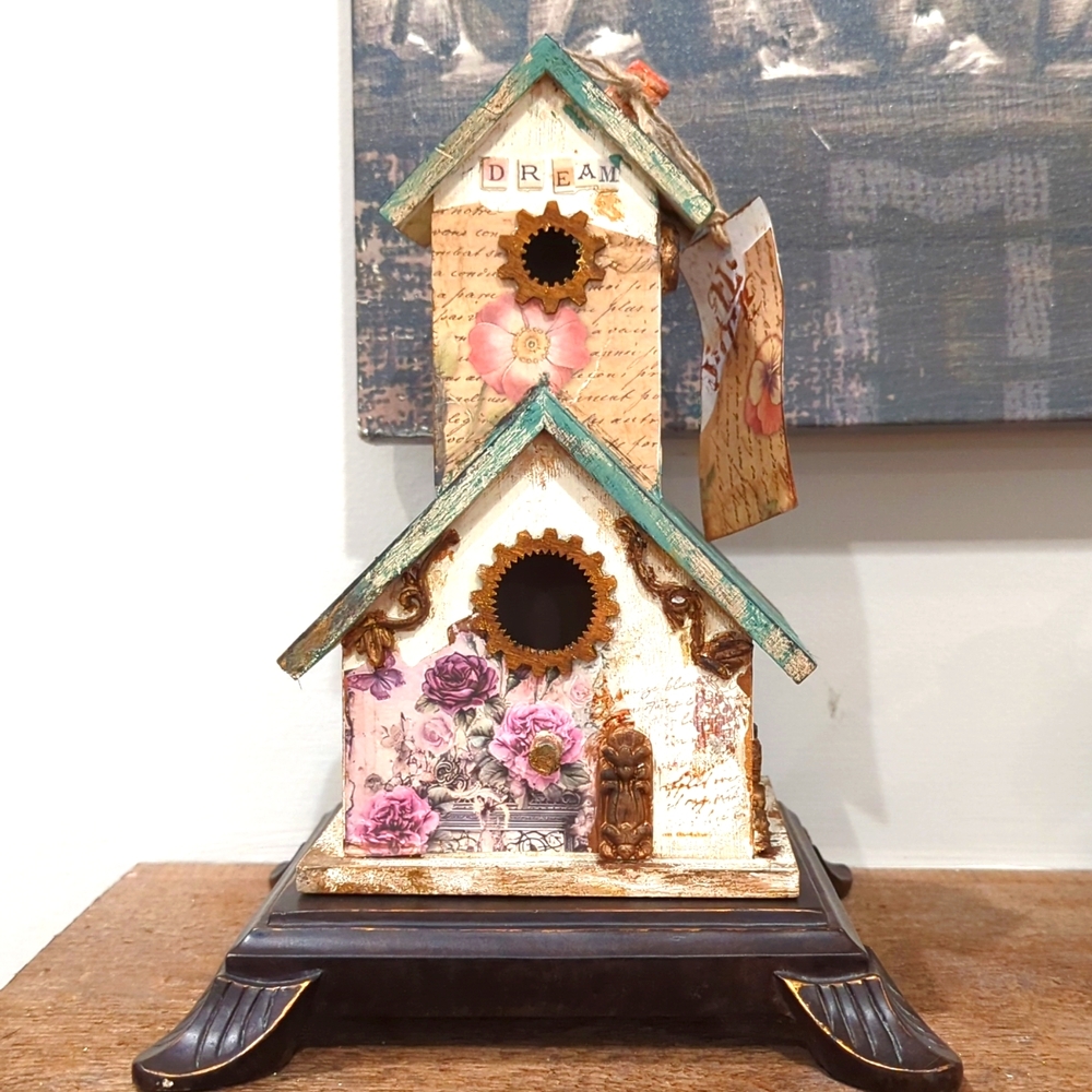 Usher in Spring with this whimsical, two story idyllic Bird house decor.
